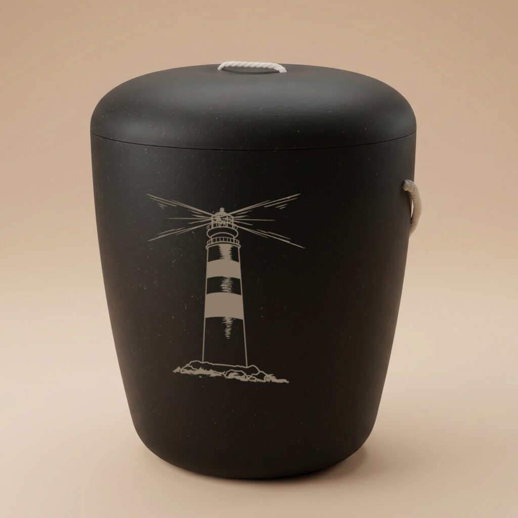 Black biodegradable cremation urn featuring a lighthouse